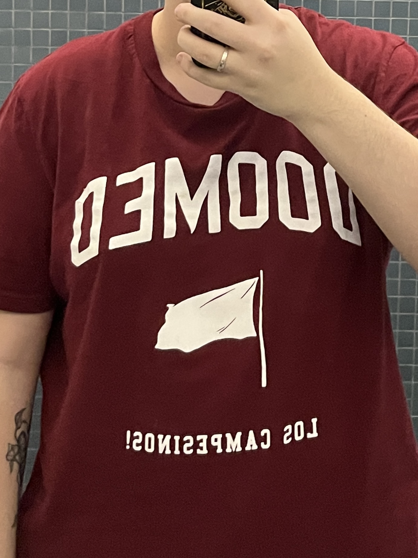 Trans man wearing a red shirt